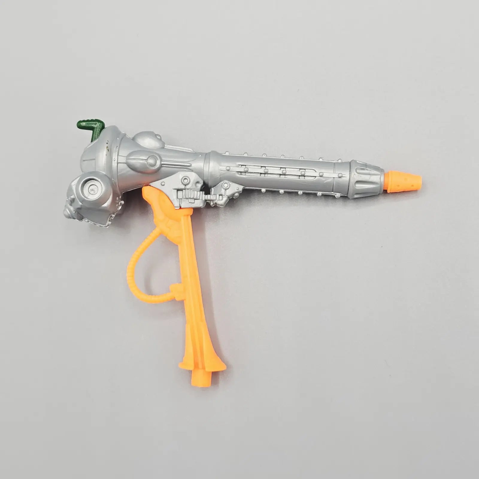 Action figure missile launcher on grey background