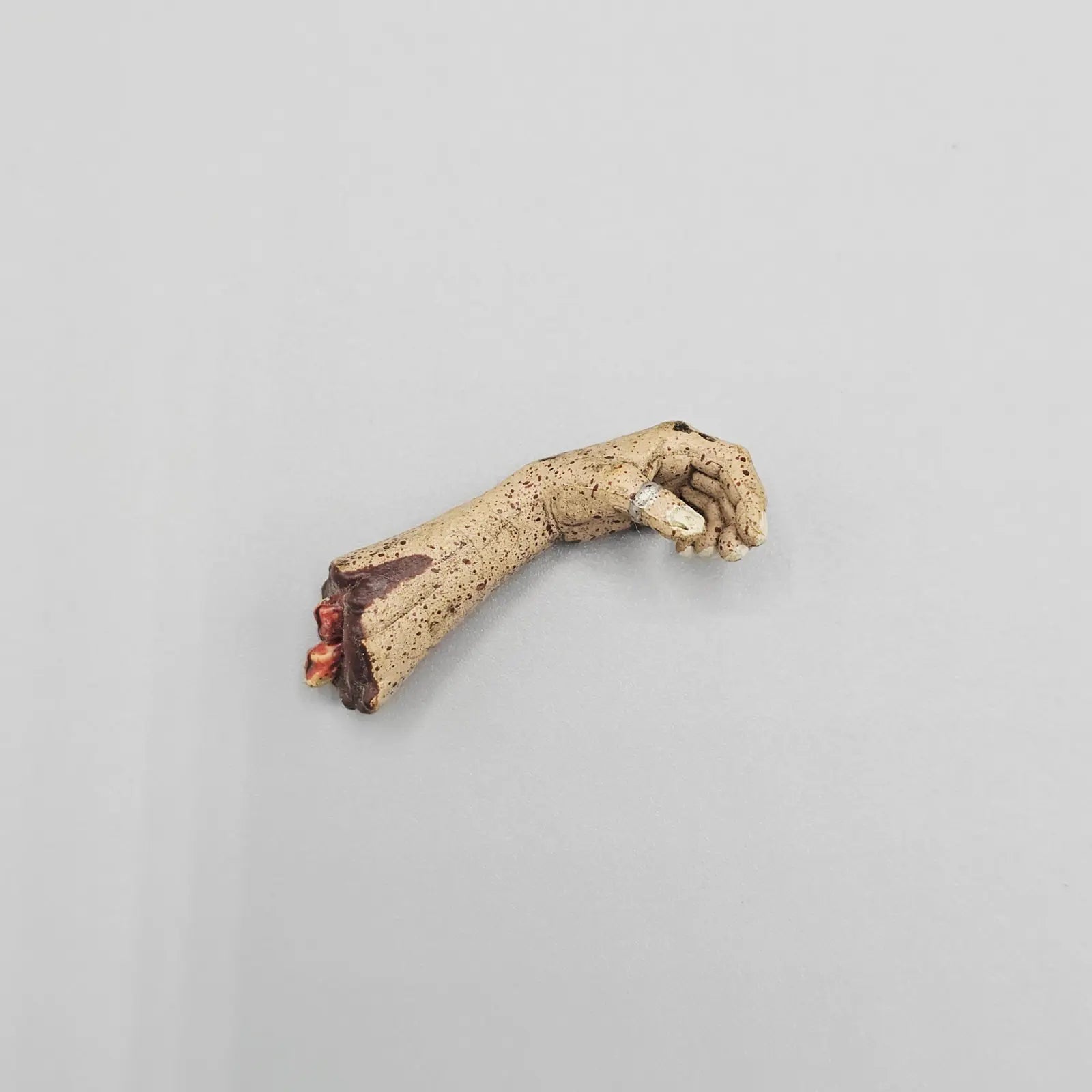 Severed arm accessory for McFarlane Movie Maniacs Leatherface action figure