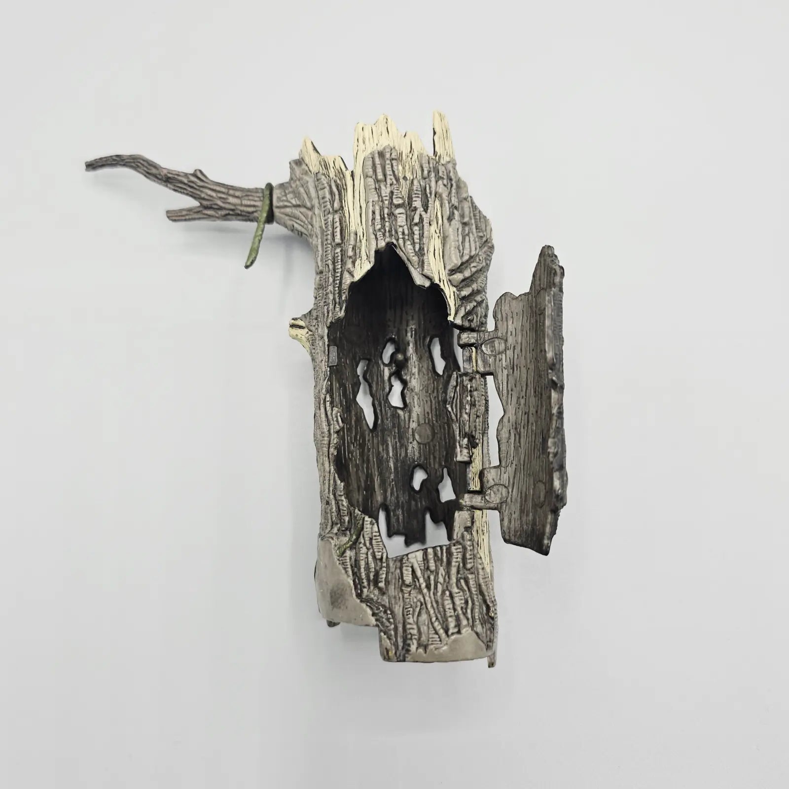 Action figure tree part with open secret door