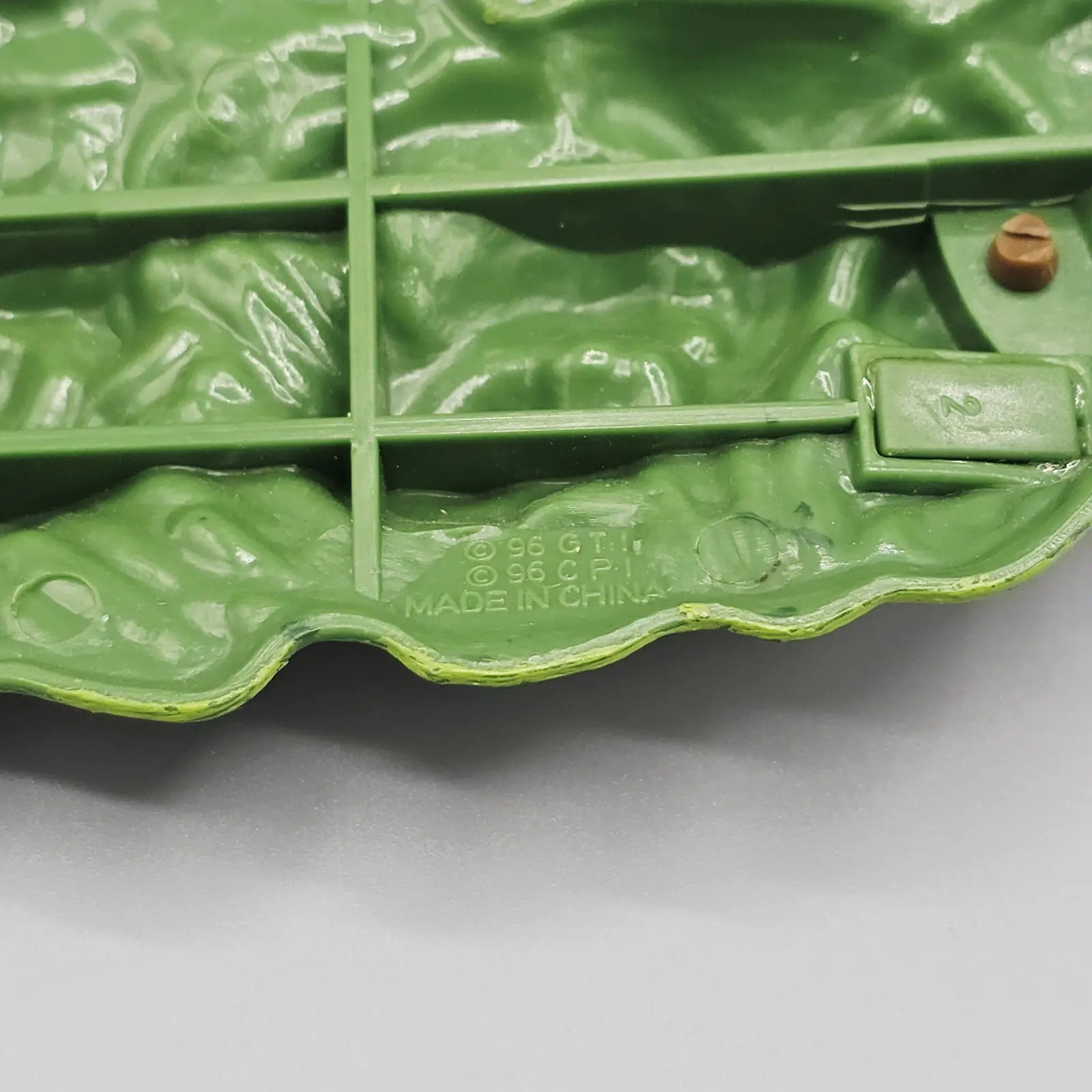 Branding on action figure base "96 GTI 96 CPI"