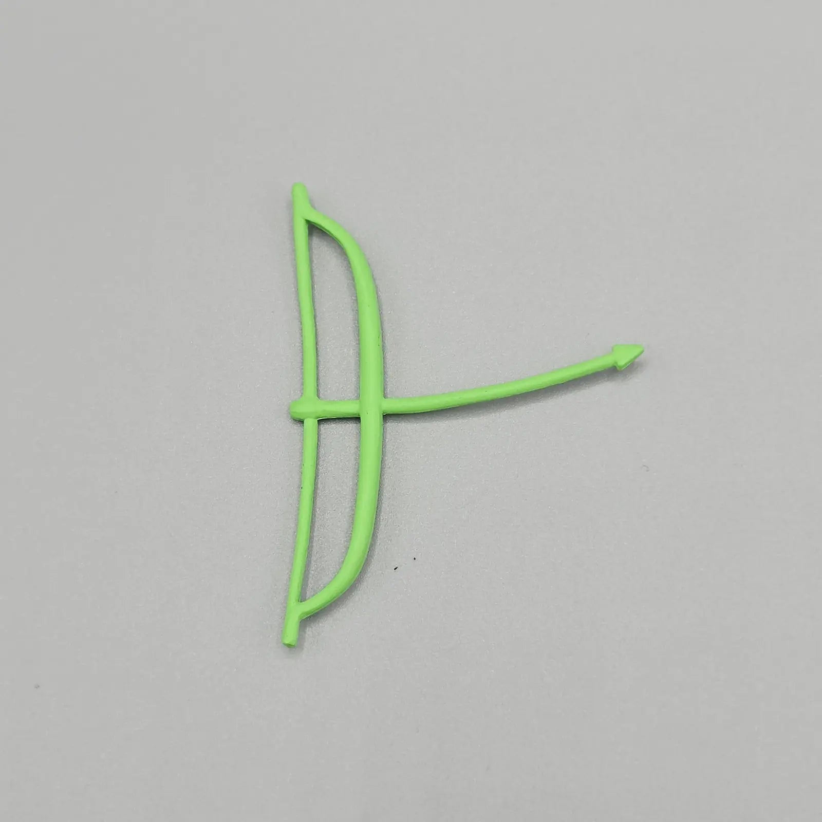 Green bow on a gray background