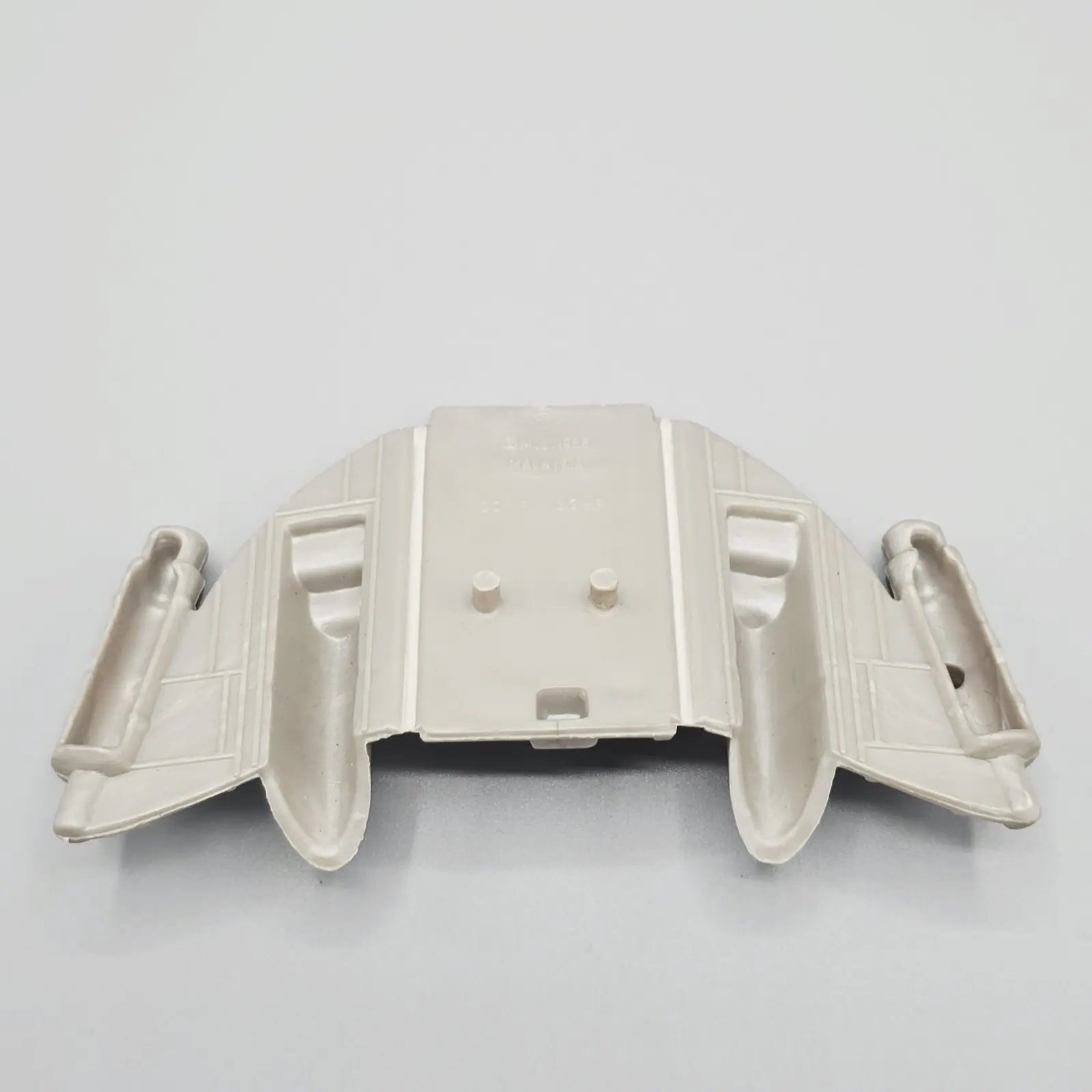 Action figure jetpack on a gray background