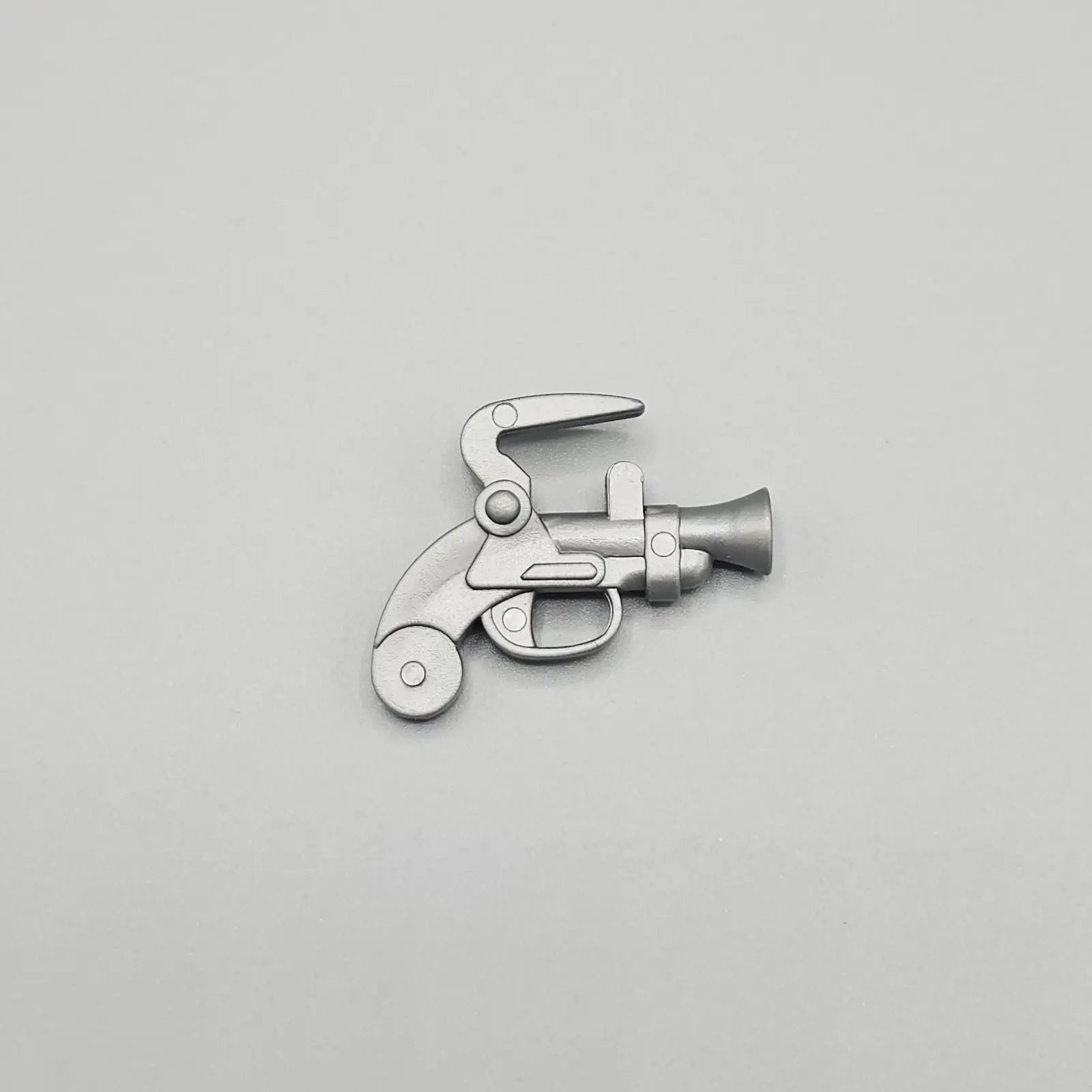 Gun accessory for Rattle Me Bones board game 1989