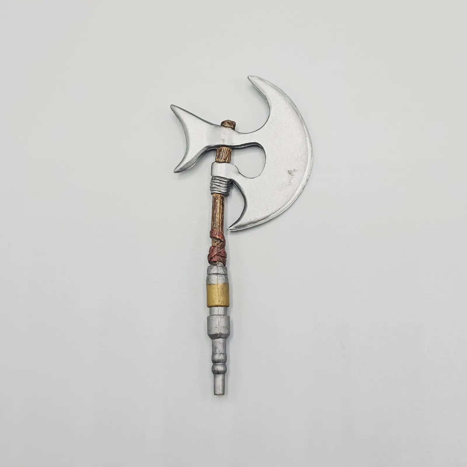 Decorative axe with a detailed handle on a light gray background