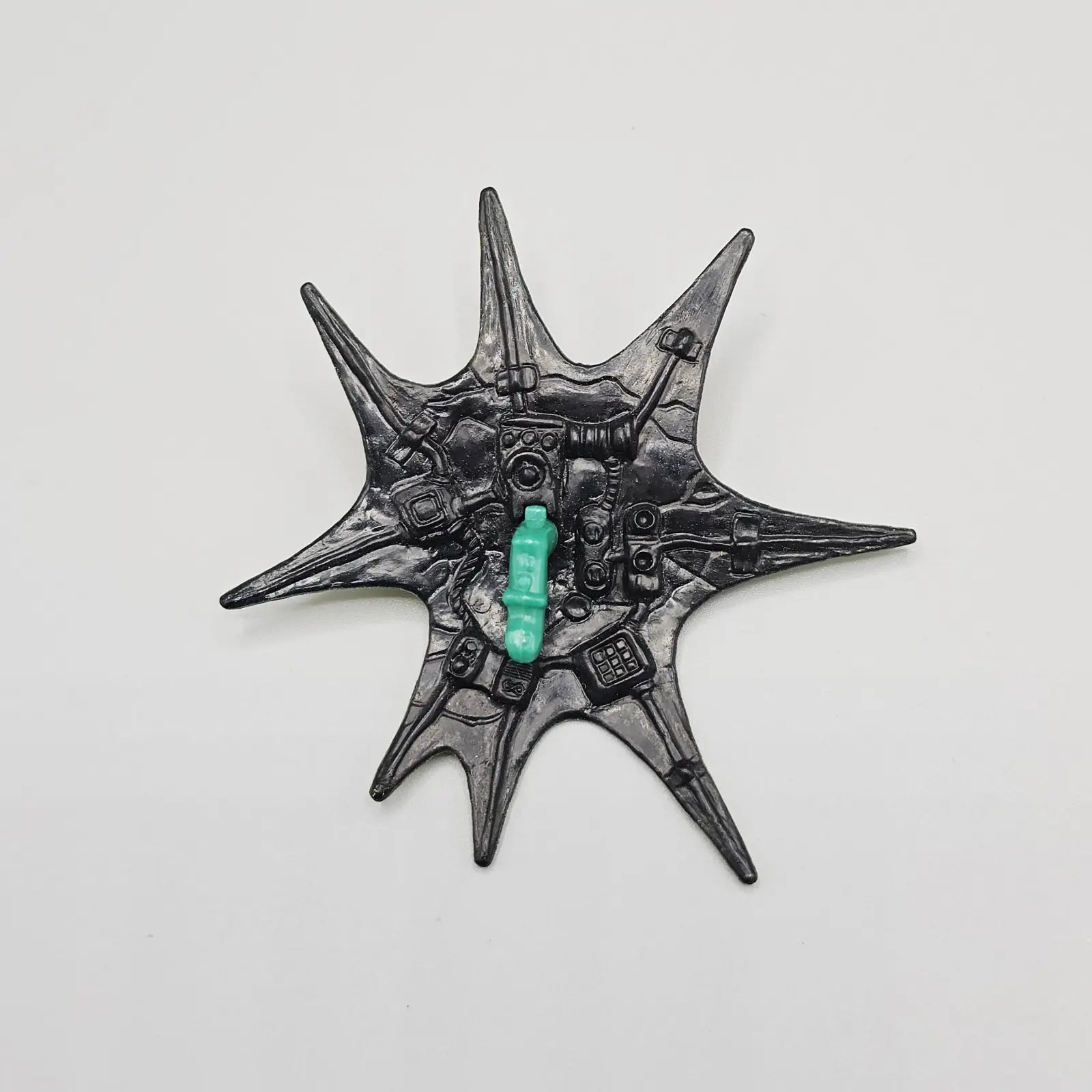Back view of shield accessory for Skeleton Warriors Aracula action figure
