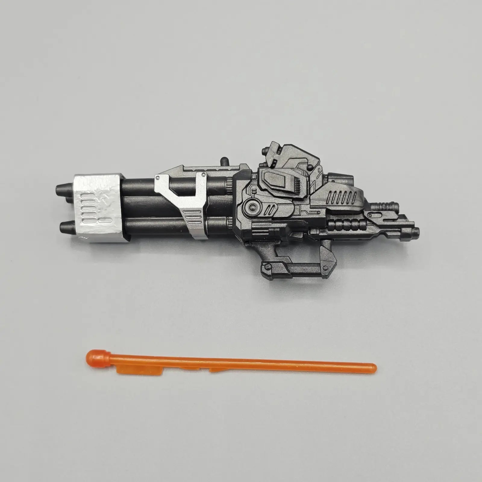 Launcher with orange missile for action figure