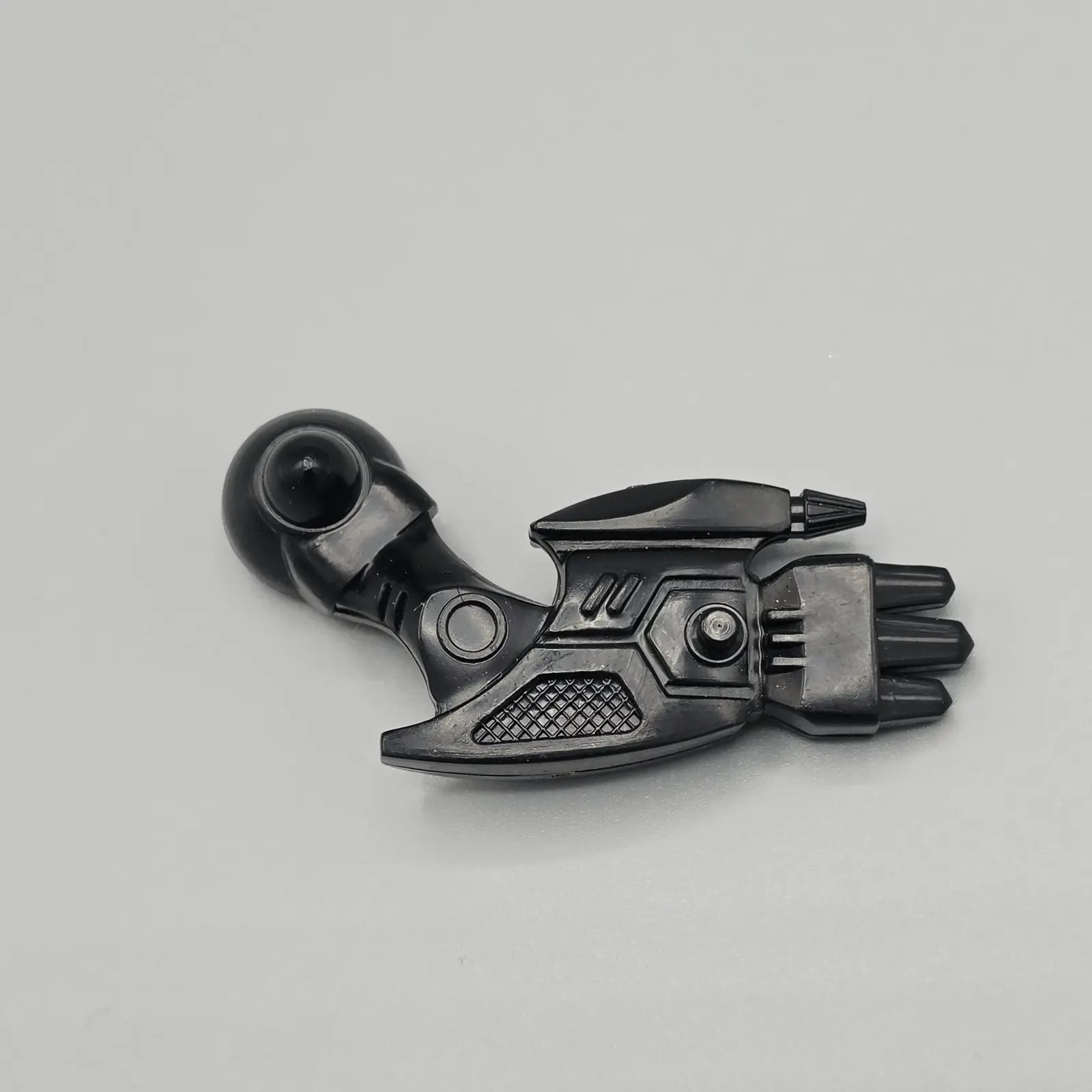 Black robot arm action figure part