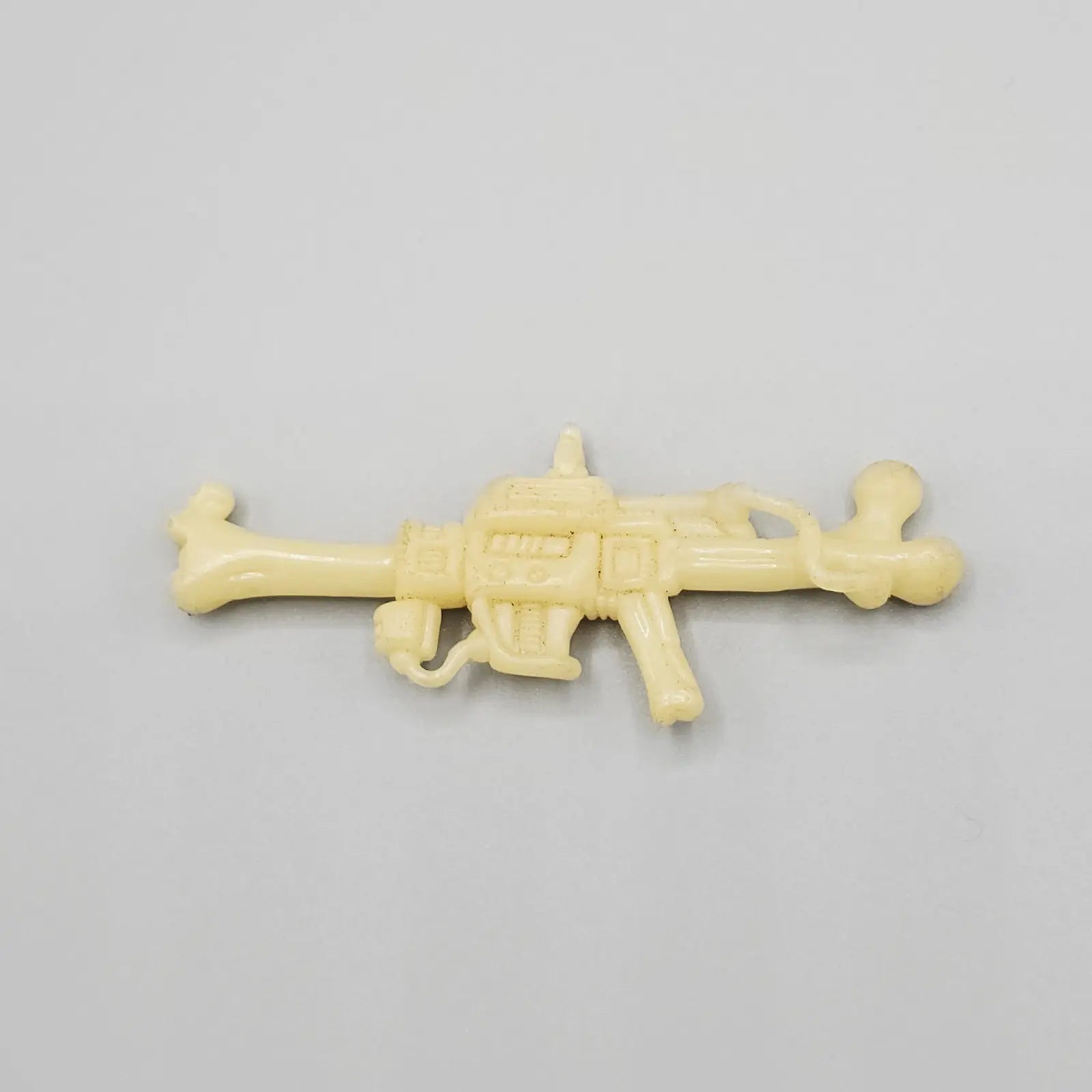 White rifle accessory for 1991 Toxic Crusaders Bonehead action figure